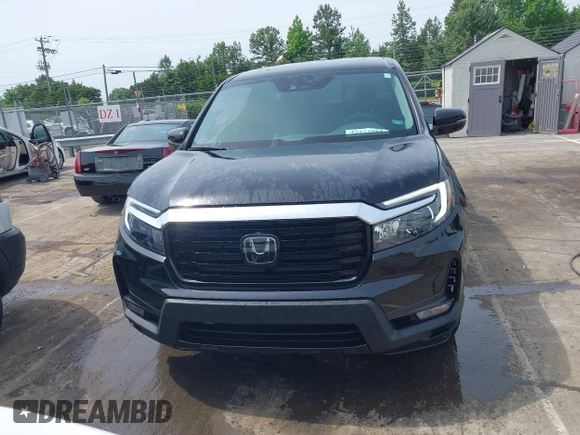 2023 Honda Ridgeline RTL-E with VIN 5FPYK3F76PB042100, listed as a IAAI auction lot 42274861 with 16,822 mi miles and . Bid and sale history available at DreamBid. Image 12.