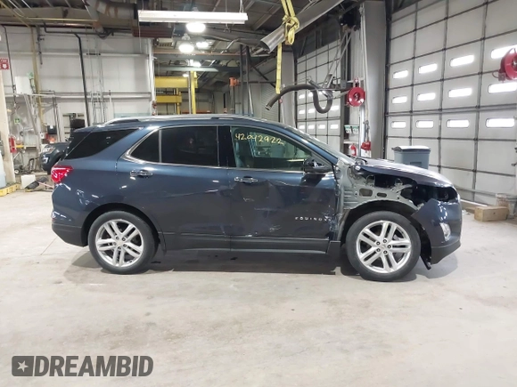2019 Chevrolet Equinox Premier z VIN 3GNAXNEVXKS500672, wystawiony jako IAAI lot #42042922 z przebiegiem 77 440 mil mil oraz . Historia ofert i sprzedaży dostępna na DreamBid. Obrazek 14.