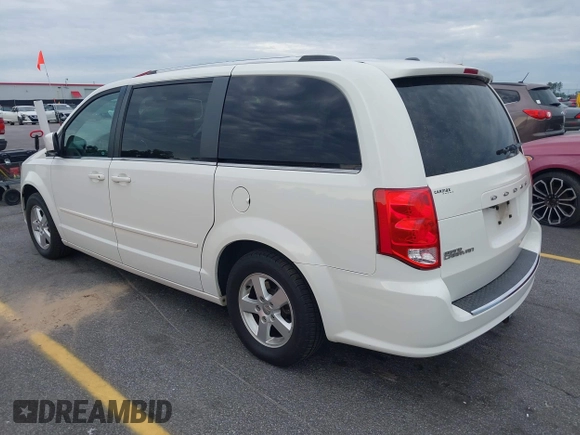 2011 Dodge Grand Caravan Crew with VIN 2D4RN5DG1BR725938, listed as a IAAI auction lot 42213308 with 162,894 mi miles and . Bid and sale history available at DreamBid. Image 3.