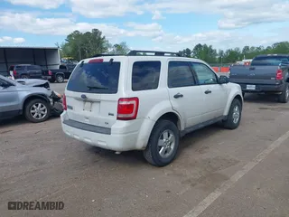 2010 Ford Escape XLT with VIN 1FMCU0DG3AKC46213, listed as a IAAI auction lot 41948197 with 167,761 mi miles. Bid and sale history available at carsss.com. Image 4.
