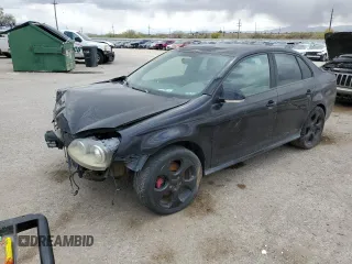 2009 Volkswagen Jetta GLI z VIN 3VWDJ71K79M042969, wystawiony jako Copart lot #50803665 z przebiegiem 191 689 mil mil oraz Szkoda całkowita • Salvage title. Historia ofert i sprzedaży dostępna na DreamBid. Obrazek 1.