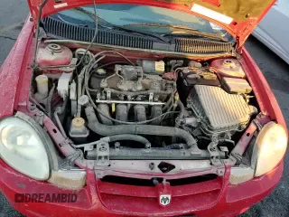 2002 Dodge Neon with VIN 1B3ES26C22D520419, listed as a Copart auction lot 84113104 with 129,714 mi miles and Salvage title. Bid and sale history available at DreamBid. Image 13.