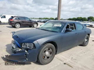 2009 Dodge Charger Police with VIN 2B3KA43V79H611772, listed as a Copart auction lot 61766995 with 167,219 mi miles and Salvage title. Bid and sale history available at DreamBid. Image 1.