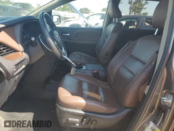 2015 Toyota Sienna Limited с VIN 5TDDK3DC7FS104041, выставлен на аукционе Copart как лот 62410335 с пробегом 112 755 миль миль и Списание • Salvage title. История ставок и продаж доступна на DreamBid. Изображение 7.