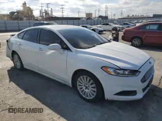 2016 Ford Fusion SE Hybrid с VIN 3FA6P0LU2GR360066, выставлен на аукционе Copart как лот 84767824 с пробегом 153 044 миль миль и Списание • Salvage title. История ставок и продаж доступна на DreamBid. Изображение 4.