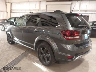 2019 Dodge Journey Crossroad with VIN 3C4PDCGG1KT728116, listed as a IAAI auction lot 41693897 with 129,867 mi miles. Bid and sale history available at carsss.com. Image 3.