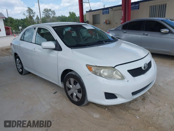 2010 Toyota Corolla with VIN 1NXBU4EE0AZ335239, listed as a IAAI auction lot 42155710 with 215,134 mi miles. Bid and sale history available at carsss.com. Image 1.