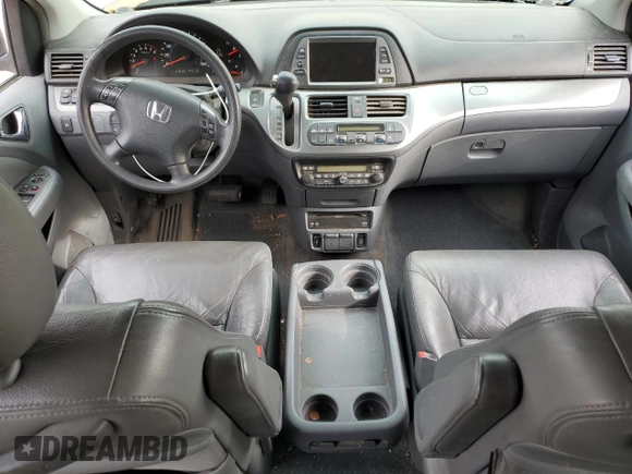 2005 Honda Odyssey EX-L with VIN 5FNRL38715B116530, listed as a Copart auction lot 50807575 with 216,434 mi miles and Salvage Title. Bid and sale history available at DreamBid. Image 8.