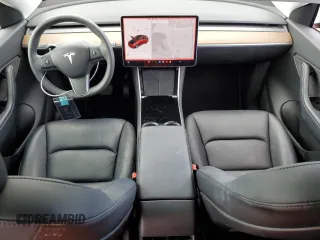 2021 Tesla Model Y Standard Range z VIN 5YJYGDED7MF111377, wystawiony jako Copart lot #45772075 z przebiegiem 34 331 mil mil oraz Szkoda całkowita • Salvage title. Historia ofert i sprzedaży dostępna na DreamBid. Obrazek 8.