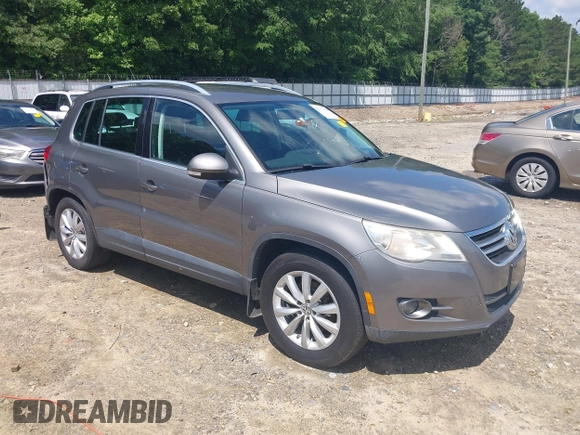2011 Volkswagen Tiguan SEL z VIN WVGBV7AX5BW512203, wystawiony jako IAAI lot #42273838 z przebiegiem 157 072 mil mil oraz . Historia ofert i sprzedaży dostępna na DreamBid. Obrazek 1.