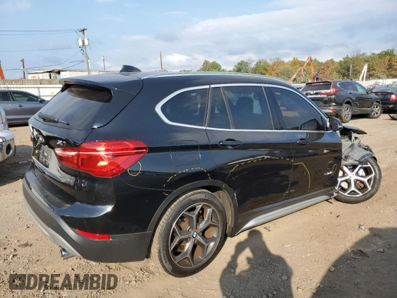 2018 BMW X1 xDrive28i with VIN WBXHT3C33J5F90612, listed as a Copart auction lot 74937654 with 72,561 mi miles and Salvage Title. Bid and sale history available at carsss.com. Image 3.