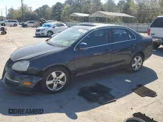 2008 Volkswagen Jetta SE с VIN 3VWRM71KX8M119779, выставлен на аукционе Copart как лот 50772025 с пробегом 128 283 миль миль и Списание • Salvage title. История ставок и продаж доступна на DreamBid. Изображение 1.