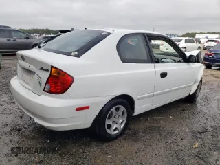2004 Hyundai Accent GL with VIN KMHCG35C84U285750, listed as a Copart auction lot 85443094 with 167,169 mi miles and Salvage Title. Bid and sale history available at carsss.com. Image 3.