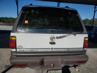 1997 Mercury Mountaineer z VIN 4M2DU52P8VUJ21527, wystawiony jako Copart lot #80867324 z przebiegiem 185 313 mil mil oraz Szkoda całkowita • Salvage title. Historia ofert i sprzedaży dostępna na DreamBid. Obrazek 6.