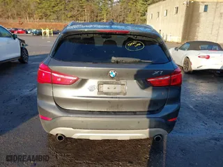 2016 BMW X1 xDrive28i with VIN WBXHT3C30GP881837, listed as a IAAI auction lot 41117389 with 84,157 mi miles. Bid and sale history available at carsss.com. Image 17.