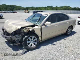 2007 Kia Optima EX z VIN KNAGE124375130841, wystawiony jako Copart lot #61384895 z przebiegiem 187 698 mil mil oraz Szkoda całkowita • Salvage title. Historia ofert i sprzedaży dostępna na DreamBid. Obrazek 1.