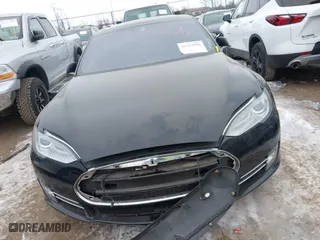 2015 Tesla Model S 85D with VIN 5YJSA1E25FF107819, listed as a IAAI auction lot 41333556 with 141,066 mi miles. Bid and sale history available at carsss.com. Image 12.