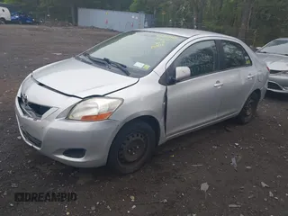 2009 Toyota Yaris with VIN JTDBT903494047486, listed as a IAAI auction lot 42173242 with 145,225 mi miles. Bid and sale history available at carsss.com. Image 2.