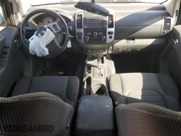 2018 Nissan Frontier Pro-4X with VIN 1N6AD0EV1JN715111, listed as a Copart auction lot 54012255 with 127,409 mi miles and Salvage title. Bid and sale history available at DreamBid. Image 8.