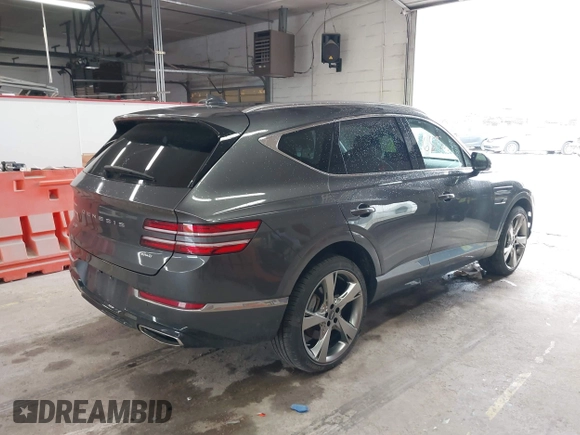 2023 Genesis GV80 with VIN KMUHBDSBXPU112470, listed as a IAAI auction lot 42326878 with 28,302 mi miles and . Bid and sale history available at DreamBid. Image 4.