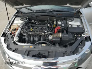 2012 Ford Fusion SE z VIN 3FAHP0HA1CR218938, wystawiony jako Copart lot #59588135 z przebiegiem 111 243 mil mil oraz Szkoda całkowita • Salvage title. Historia ofert i sprzedaży dostępna na DreamBid. Obrazek 11.
