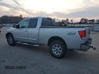 2005 Nissan Titan SE with VIN 1N6BA06B45N539629, listed as a Copart auction lot 82527074 with 154,255 mi miles and Salvage title. Bid and sale history available at DreamBid. Image 2.