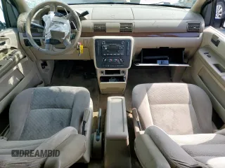 2004 Ford Freestar SEL z VIN 2FMZA52214BA84555, wystawiony jako Copart lot #54569535 z przebiegiem Nie podano mil oraz Szkoda całkowita • Salvage title. Historia ofert i sprzedaży dostępna na DreamBid. Obrazek 8.