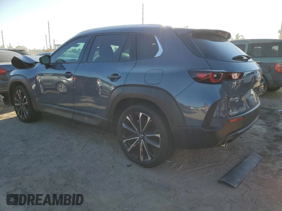 2023 Mazda CX-50 S Premium Plus with VIN 7MMVABEMXPN106060, listed as a Copart auction lot 42472923 with 8,250 mi miles and . Bid and sale history available at DreamBid. Image 2.