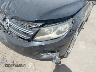2012 Volkswagen Tiguan SE with VIN WVGAV7AX6CW521960, listed as a IAAI auction lot 42249355 with 118,496 mi miles and . Bid and sale history available at DreamBid. Image 6.