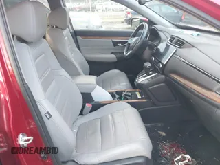 2020 Honda CR-V Touring with VIN 2HKRW2H96LH659793, listed as a IAAI auction lot 41145758 with 113,344 mi miles and . Bid and sale history available at DreamBid. Image 5.