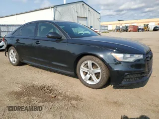 2014 Audi A6 z VIN WAUJFCFC5EN088234, wystawiony jako Copart lot #73667904 z przebiegiem 112 252 mil mil oraz Szkoda całkowita • Salvage title. Historia ofert i sprzedaży dostępna na DreamBid. Obrazek 4.