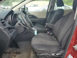 2012 Mazda 5 Sport with VIN JM1CW2BL4C0110696, listed as a Copart auction lot 58699865 with 201,603 mi miles and Salvage title. Bid and sale history available at DreamBid. Image 7.