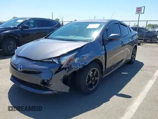 2016 Toyota Prius Two z VIN JTDKBRFU1G3521884, wystawiony jako IAAI lot #42081852 z przebiegiem 93 107 mil mil oraz . Historia ofert i sprzedaży dostępna na DreamBid. Obrazek 17.