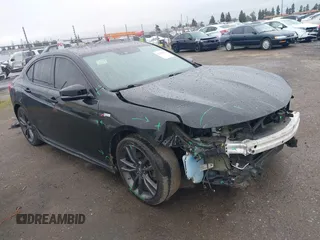 2019 Acura TLX w/A-Spec Pkg z VIN 19UUB2F61KA005581, wystawiony jako IAAI lot #41799207 z przebiegiem 66 999 mil mil oraz . Historia ofert i sprzedaży dostępna na DreamBid. Obrazek 1.
