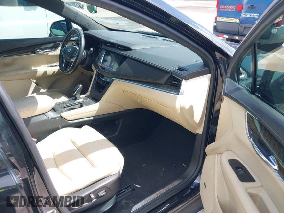 2017 Cadillac XT5 FWD with VIN 1GYKNARS6HZ123114, listed as a IAAI auction lot 41933928 with 166,213 mi miles. Bid and sale history available at carsss.com. Image 5.