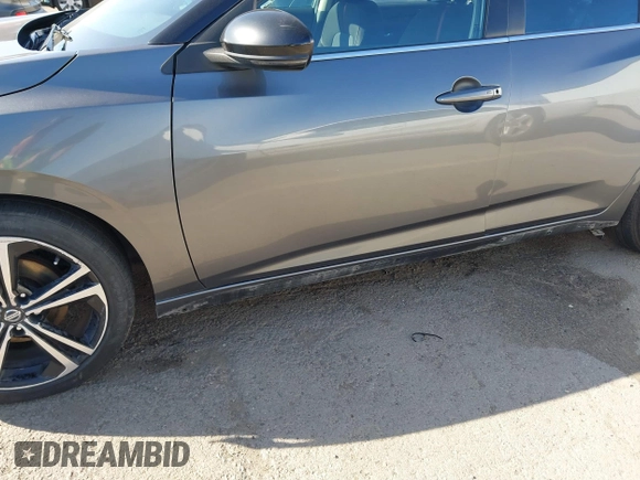 2021 Nissan Sentra SR z VIN 3N1AB8DV0MY290032, wystawiony jako IAAI lot #41819281 z przebiegiem 265 088 mil mil oraz . Historia ofert i sprzedaży dostępna na DreamBid. Obrazek 21.