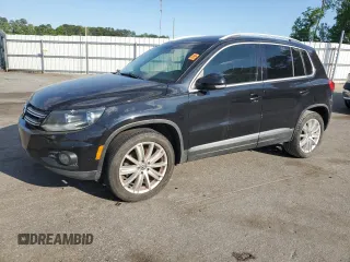 2012 Volkswagen Tiguan SE z VIN WVGAV7AX4CW601712, wystawiony jako Copart lot #55470515 z przebiegiem 181 080 mil mil oraz Czysty tytuł • Clean title. Historia ofert i sprzedaży dostępna na DreamBid. Obrazek 1.