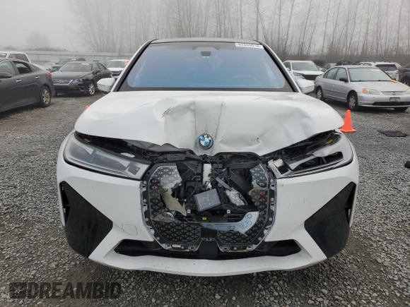 2023 BMW iX xDrive50 with VIN WB523CF04PCL67044, listed as a Copart auction lot 82805014 with 12,858 mi miles and Salvage Title. Bid and sale history available at carsss.com. Image 5.