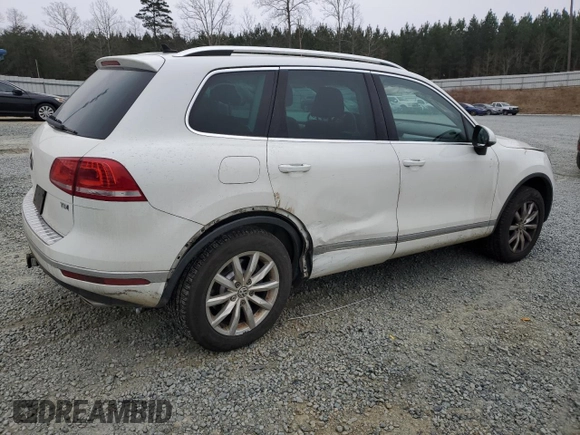 2015 Volkswagen Touareg Lux с VIN WVGEP9BP2FD002247, выставлен на аукционе Copart как лот 41924615 с пробегом 127 543 миль миль и Списание • Salvage title. История ставок и продаж доступна на DreamBid. Изображение 3.