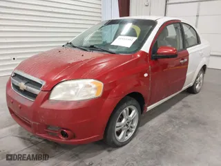 2011 Chevrolet Aveo LT w/1LT with VIN KL1TD5DE4BB118796, listed as a IAAI auction lot 41932392 with 128,034 mi miles. Bid and sale history available at carsss.com. Image 2.