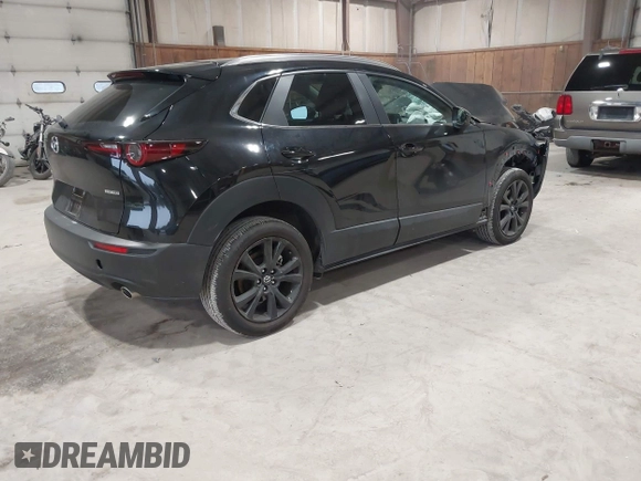2025 Mazda CX-30 S Select Sport with VIN 3MVDMBBM2SM755621, listed as a IAAI auction lot 41945799 with 2,401 mi miles and . Bid and sale history available at DreamBid. Image 4.