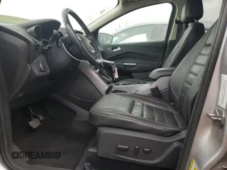 2016 Ford Escape SE z VIN 1FMCU0G91GUC59990, wystawiony jako Copart lot #56956395 z przebiegiem 112 706 mil mil oraz Szkoda całkowita • Salvage title. Historia ofert i sprzedaży dostępna na DreamBid. Obrazek 7.