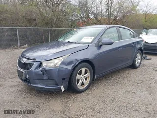 2014 Chevrolet Cruze 1LT with VIN 1G1PC5SB0E7213216, listed as a IAAI auction lot 41955710 with 147,003 mi miles. Bid and sale history available at carsss.com. Image 18.