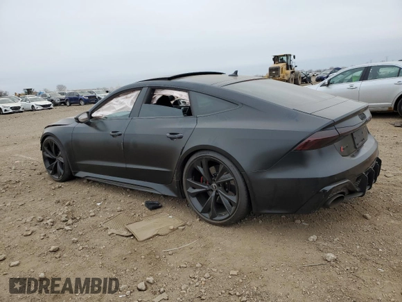 2021 Audi RS 7 z VIN WUAPCBF28MN901560, wystawiony jako Copart lot #84767714 z przebiegiem Nie podano mil oraz Szkoda całkowita • Salvage title. Historia ofert i sprzedaży dostępna na DreamBid. Obrazek 2.