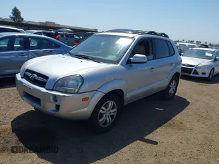 2007 Hyundai Tucson SE with VIN KM8JN12D07U632975, listed as a IAAI auction lot 42099734 with 154,320 mi miles. Bid and sale history available at carsss.com. Image 2.