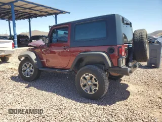 2010 Jeep Wrangler Rubicon with VIN 1J4BA6D14AL167077, listed as a Copart auction lot 54233795 with 148,638 mi miles and Salvage title. Bid and sale history available at DreamBid. Image 2.