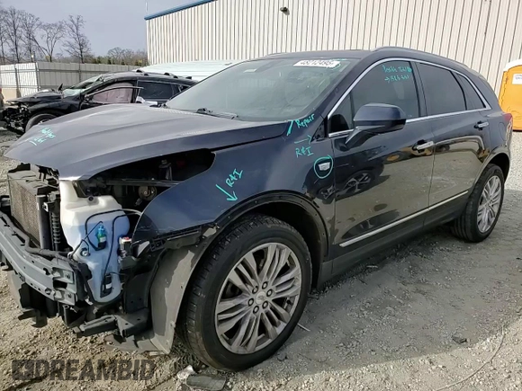 2017 Cadillac XT5 Premium Luxury FWD with VIN 1GYKNCRS5HZ198298, listed as a Copart auction lot 48212495 with 95,648 mi miles and Salvage Title. Bid and sale history available at DreamBid. Image 12.
