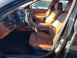 2011 BMW 7 Series 750Li with VIN WBAKB8C52BCY66628, listed as a Copart auction lot 77191054 with 39,503 mi miles and Salvage Title. Bid and sale history available at carsss.com. Image 7.