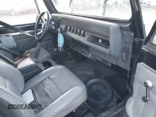 1990 Jeep Wrangler with VIN 2J4FY29T2LJ543655, listed as a IAAI auction lot 41766772 with 999,999 mi miles. Bid and sale history available at carsss.com. Image 5.