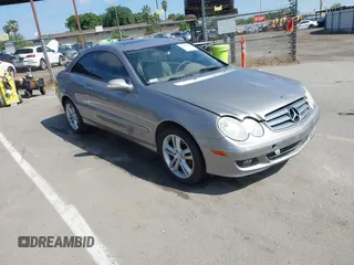 2007 Mercedes-Benz CLK-Class 3.5L with VIN WDBTJ56H47F215889, listed as a IAAI auction lot 42109563 with 106,593 mi miles. Bid and sale history available at carsss.com. Image 1.